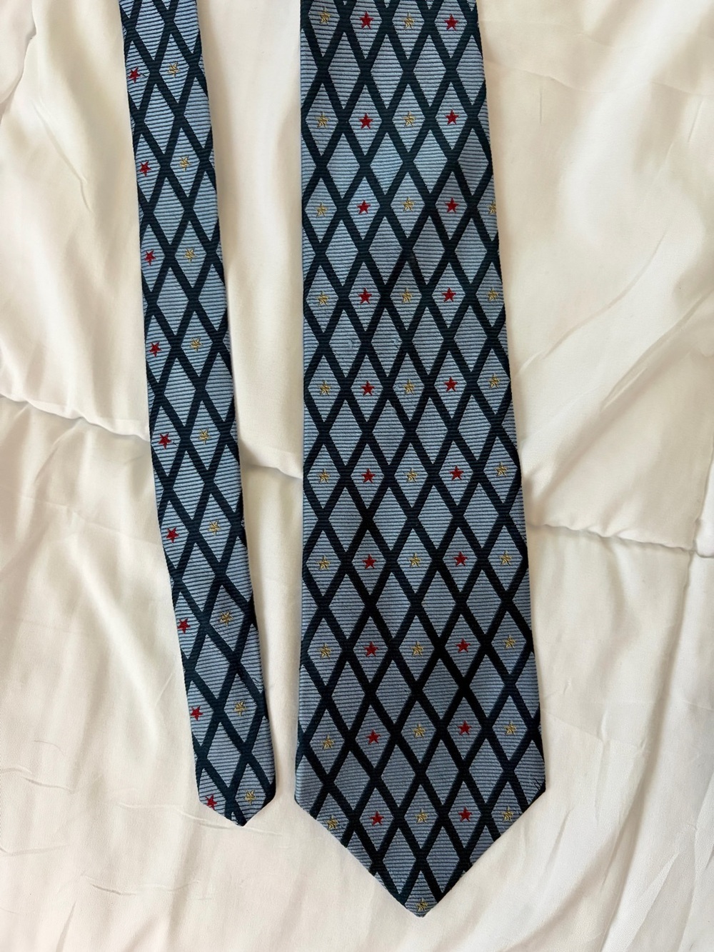 Tommy Hilfiger Light Blue Silk Tie with Navy Lattice and Red & Gold Stars